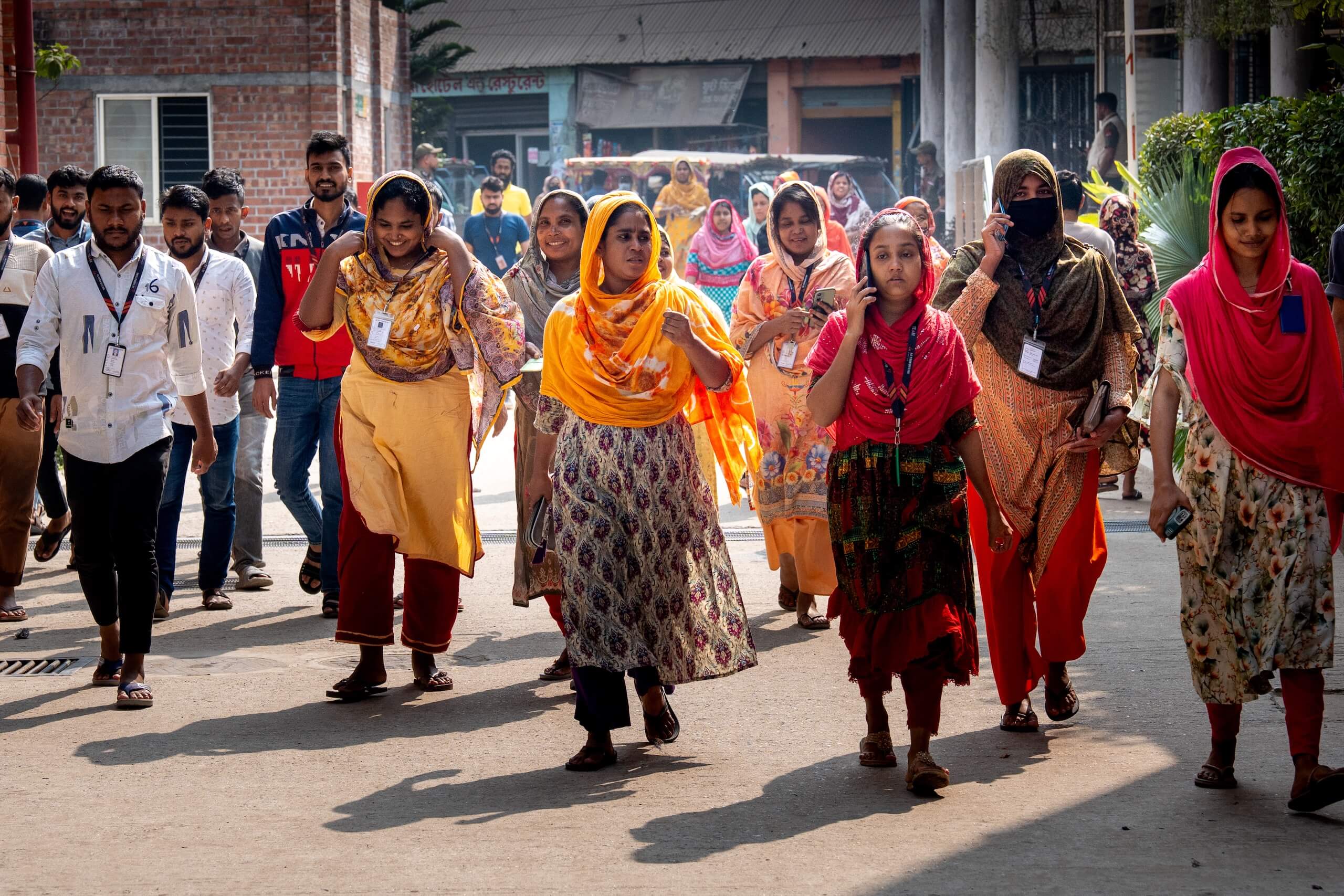 Factory workers walking outside