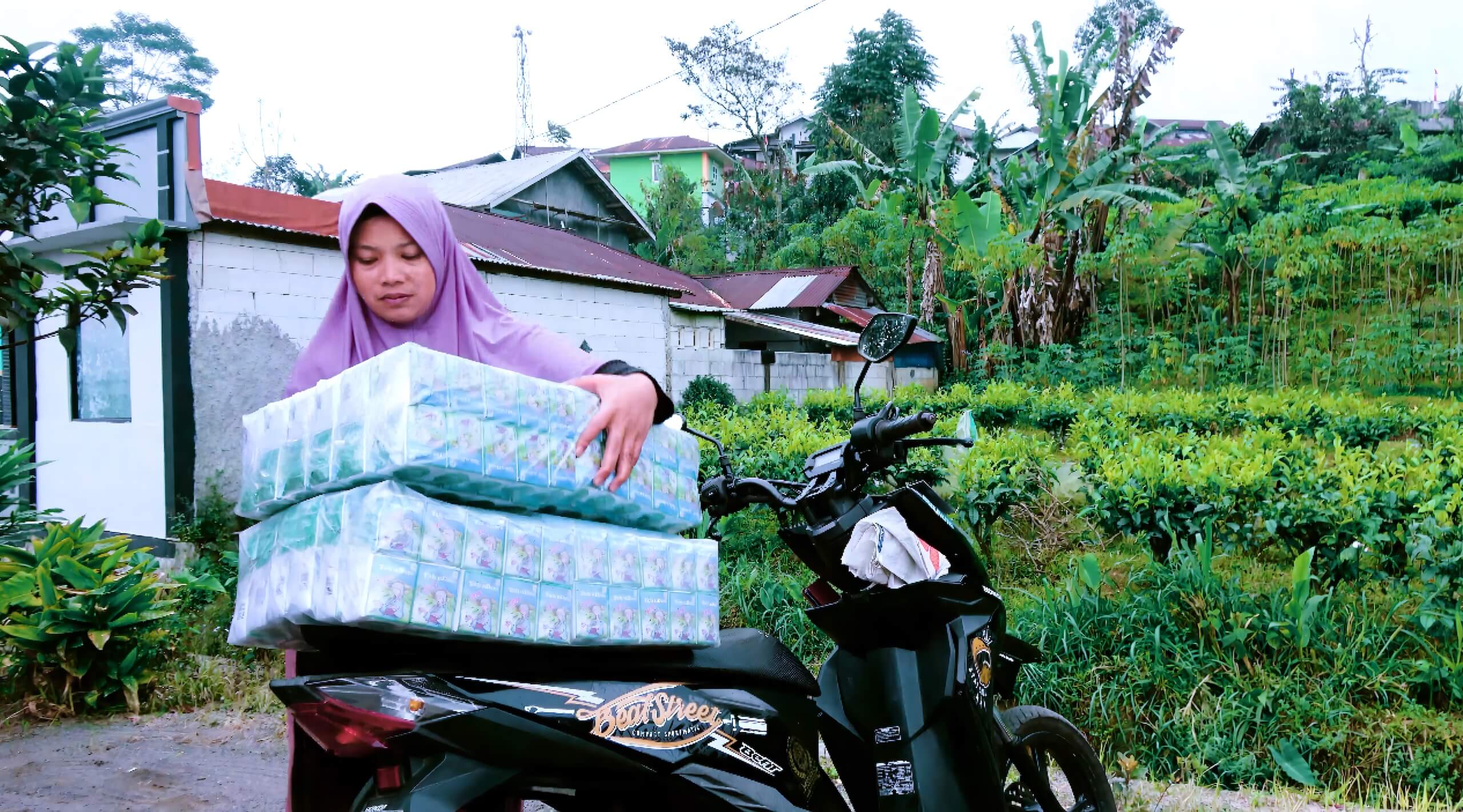 Mrs Watini selling tea